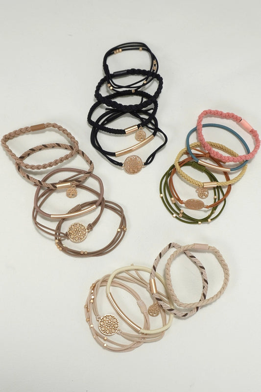 Boho dual-function bracelet hair ties with gold plating, designed for use as both a stylish wrist accessory and a gentle hair tie.