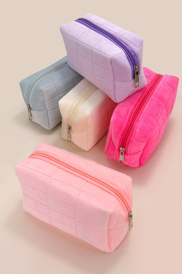 Luxurious velvet travel cosmetic makeup pouch with a zip closure, perfect for storing beauty essentials.