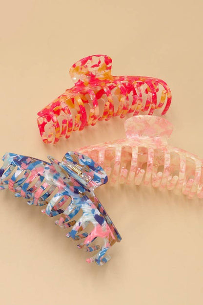 Large colorful mermaid hair claw clip with an ocean-inspired design, perfect for secure and stylish updos.