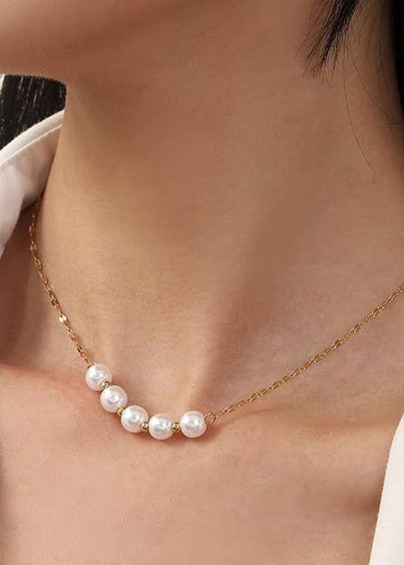 Titanium Tarnish-Free Modern 5-Pearl Gold Necklace with a durable gold chain and 5 delicate pearls.