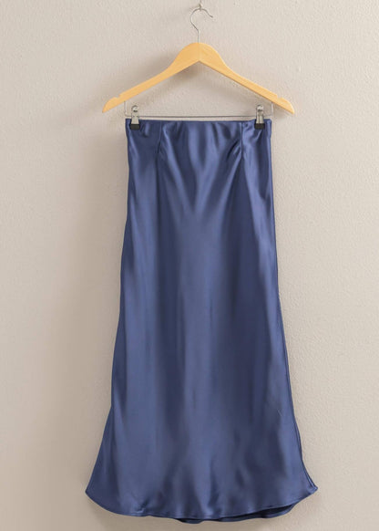 Blue Satin midi skirt with a mid-rise silhouette, pull-on elastic waist, and breezy hem.