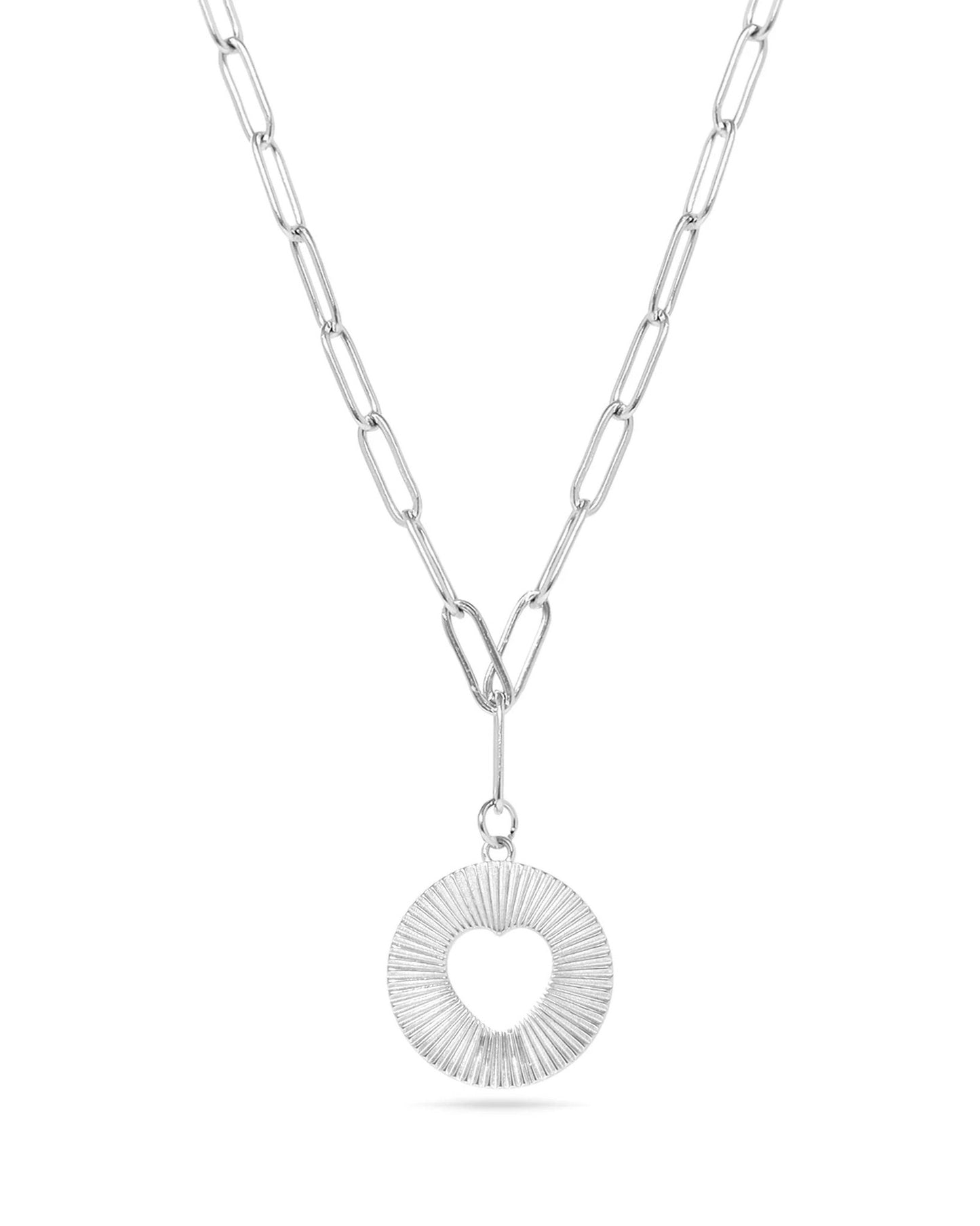 Silver Waterproof Paperclip Chain Necklace with cutout Heart and Sunburst Pendant.