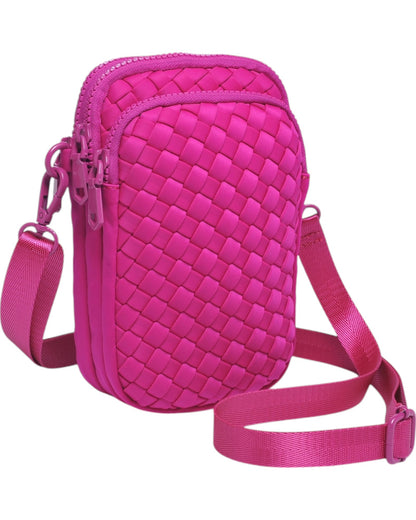 Compact neoprene cell phone crossbody bag with three zippered compartments and adjustable strap in Fuchsia.