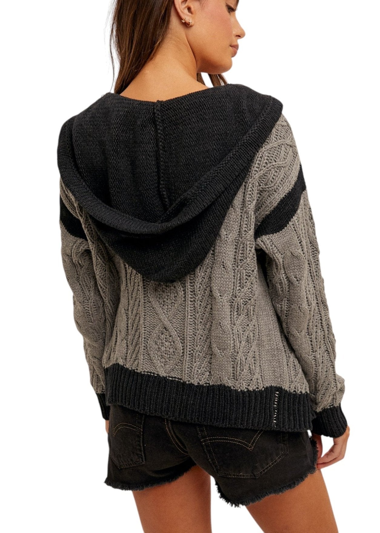 Women's color-block cable knit hoodie sweater with zippered front, soft cotton blend, and cozy hood in gray and black. 