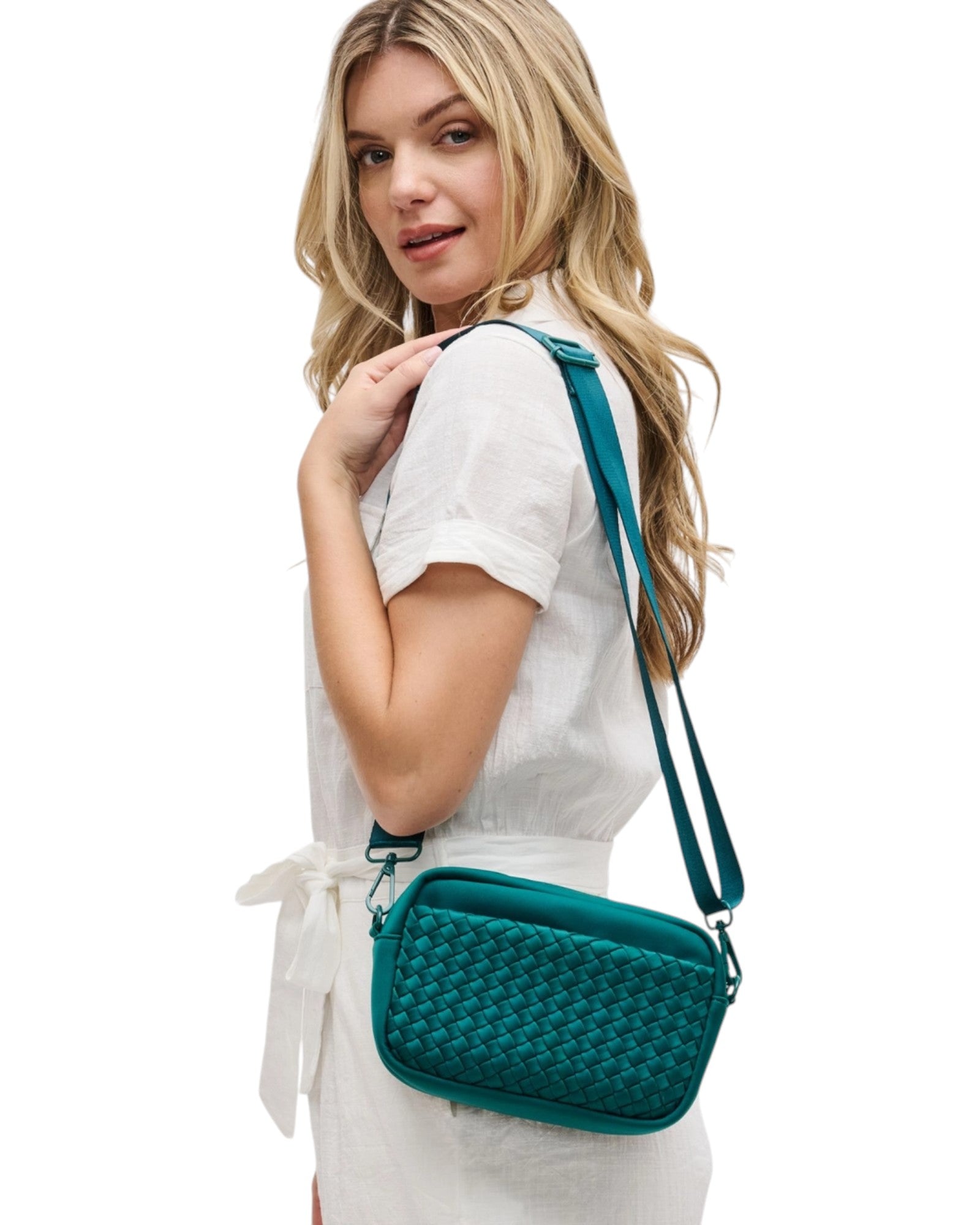 Forest Green woven neoprene crossbody bag with adjustable strap, top zip closure, and convenient side pockets.