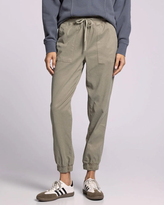 Soft sage Tencel jogger pants with an elastic waistband, drawstrings, and cropped hem.