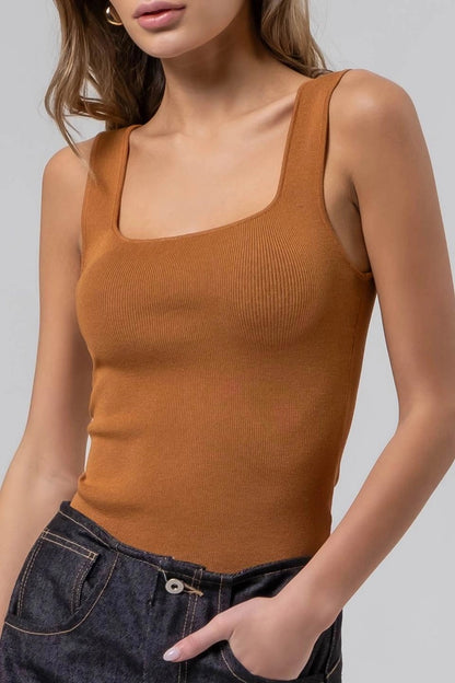 Cinnamon-colored ribbed knit tank with a square neckline and wide straps.