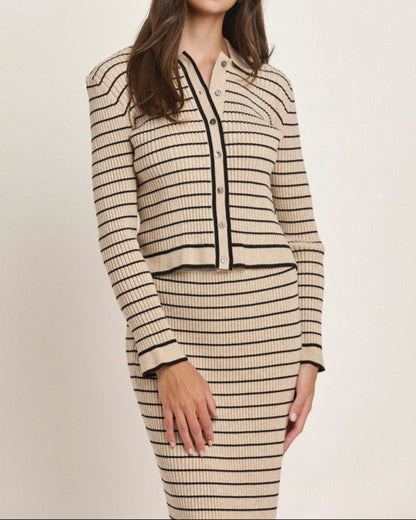 Tan and black striped knit two-piece set with a button-up cardigan top and midi skirt.