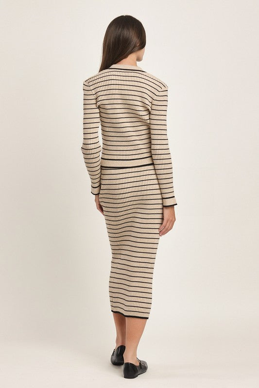 Tan and black striped knit two-piece set with a button-up cardigan top and midi skirt.