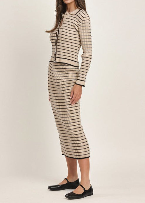 Tan and black striped knit two-piece set with a button-up cardigan top and midi skirt.