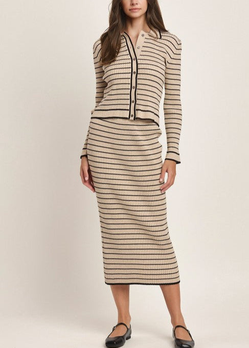 Tan and black striped knit two-piece set with a button-up cardigan top and midi skirt.