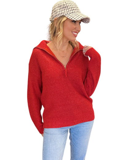 Bright Ruby Red half-zip sweater with a textured knit and relaxed fit. 