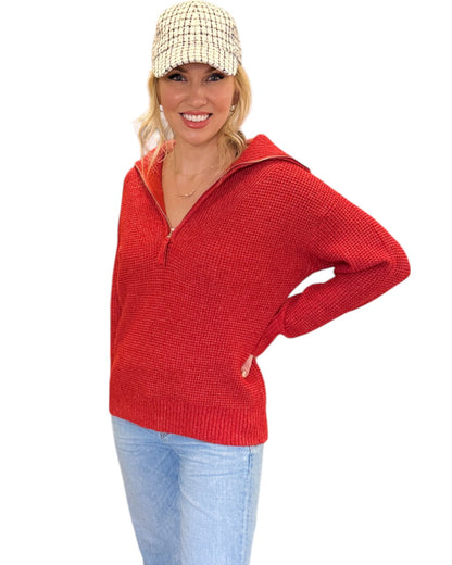 Bright Ruby Red half-zip sweater with a textured knit and relaxed fit. 