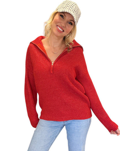 Bright Ruby Red half-zip sweater with a textured knit and relaxed fit. 