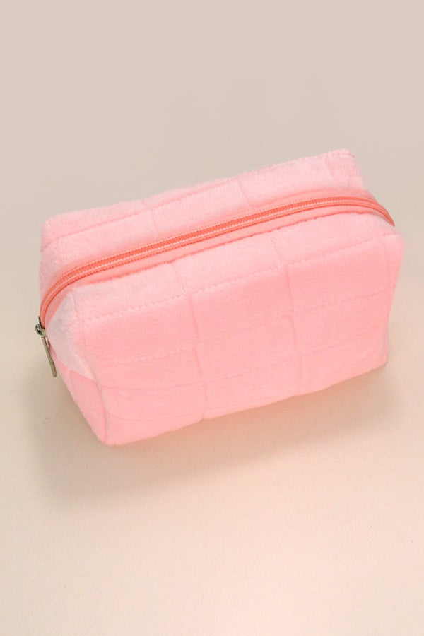 Luxurious velvet travel cosmetic makeup pouch with a zip closure, perfect for storing beauty essentials.