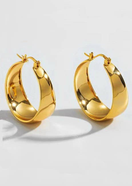 Tarnish-Free Chunky 18K Stainless Gold Hoops with a bold design, crafted from waterproof and hypoallergenic stainless steel.