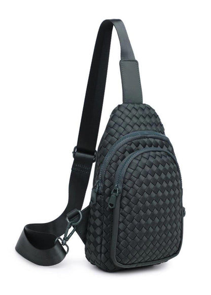 Woven neoprene women's sling backpack in Black with adjustable strap and zippered compartments.