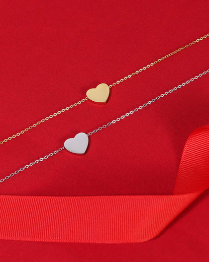 Silver and gold waterproof heart necklaces with a dainty, minimalist chains.