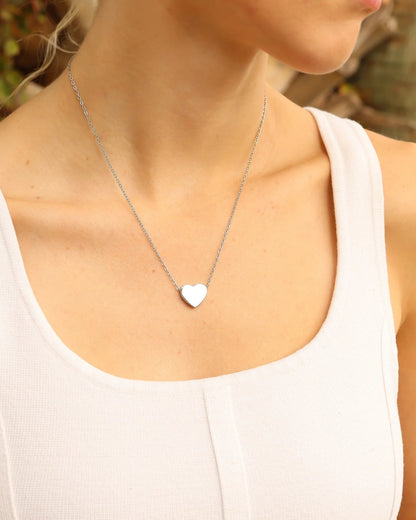 Silver waterproof heart necklace with a dainty, minimalist chain.